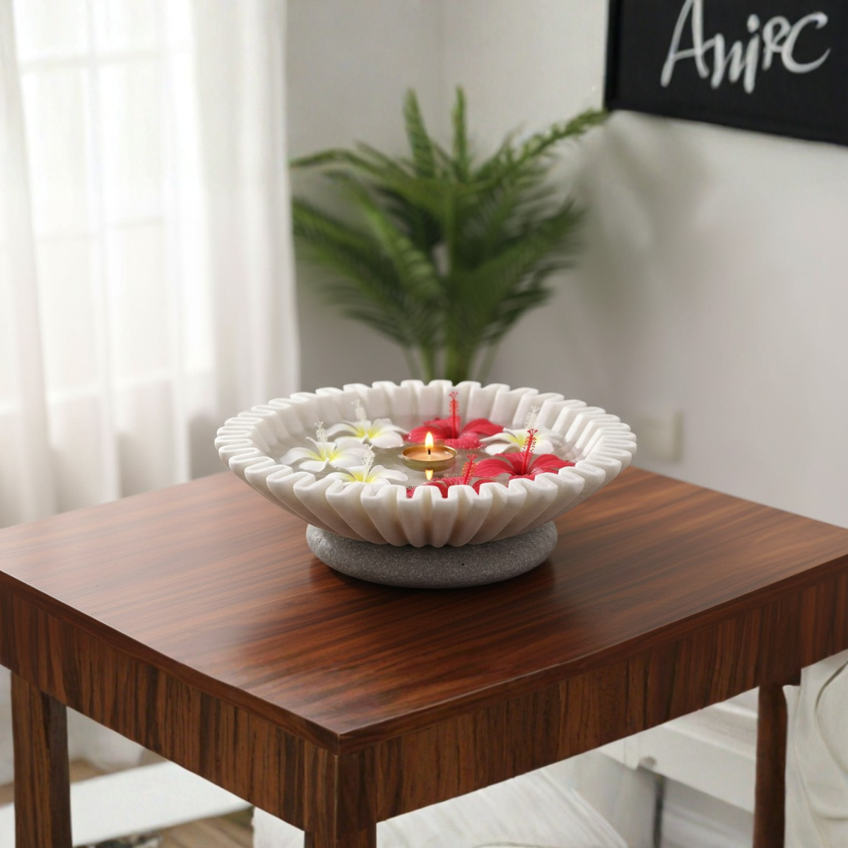 Handcrafted marble urli bowl for temple decoration and spiritual interior made from natural stone